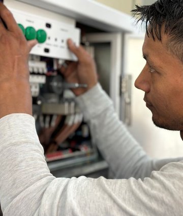 Electrician working on a switchboard